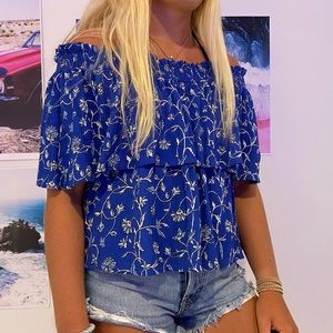 blue off the shoulder shirt